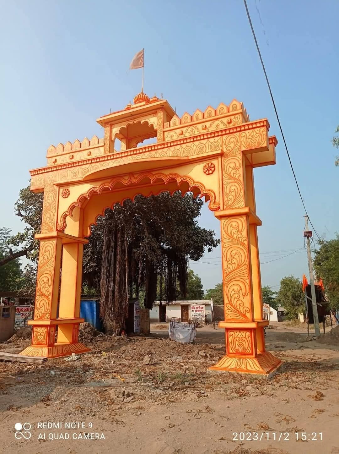 Ornate saffron temple gateway